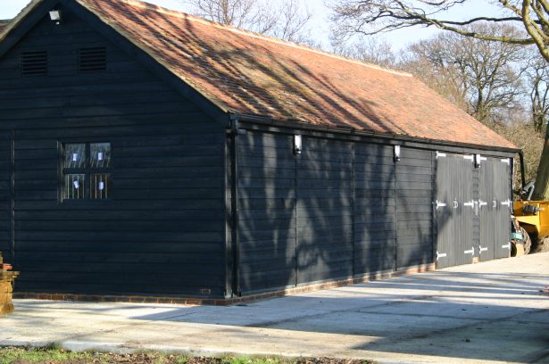 american barn, large timber building, spacious storage space, extra storage space, internal stables